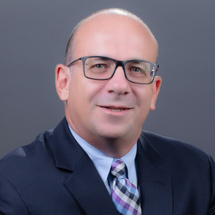 Headshot of Hilton Sher